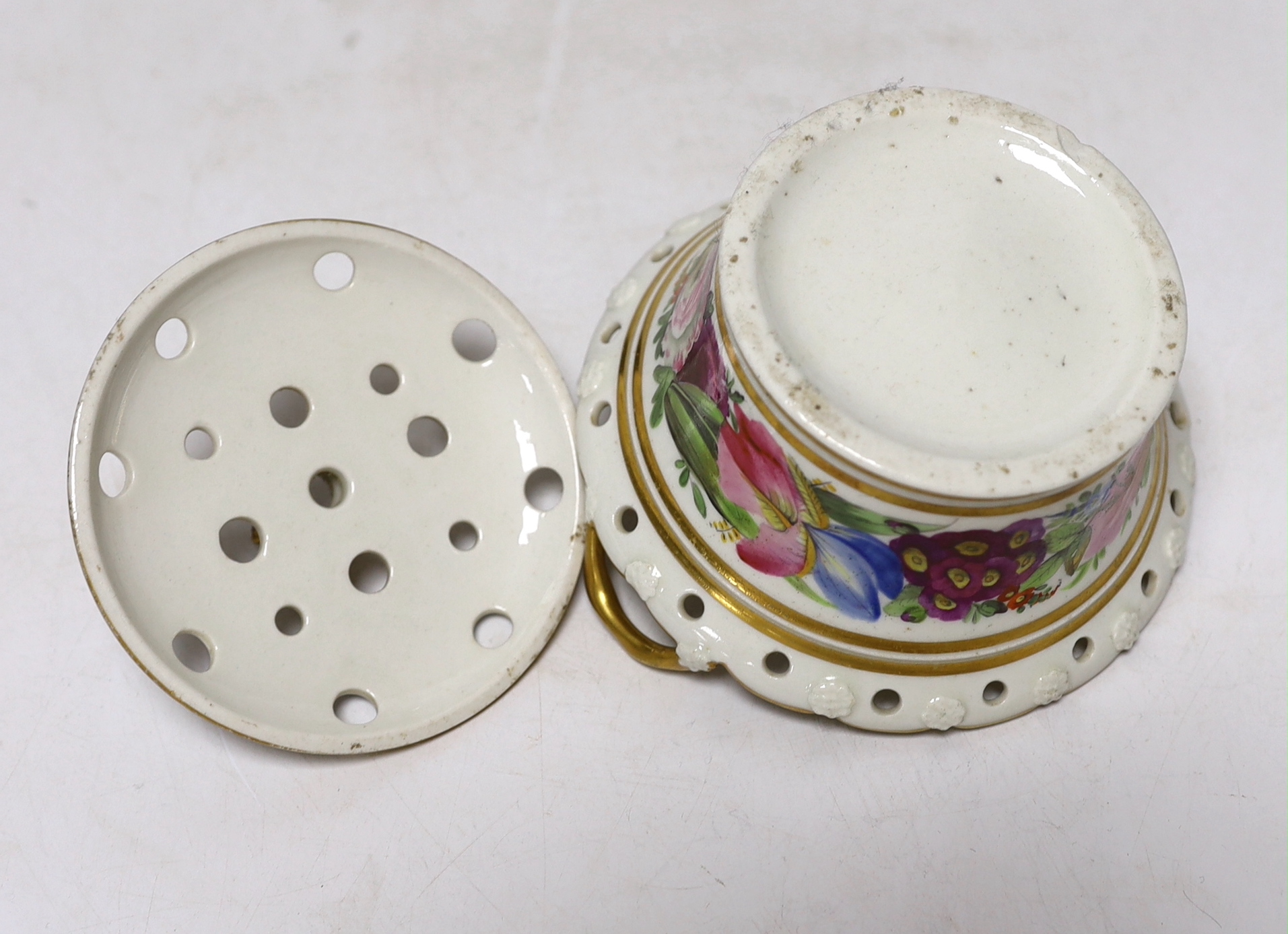 A Coalport pot pourri basket and cover painted with flowers, perhaps in the workshop of Thomas Baxter c.1805-10, 7.5cm high